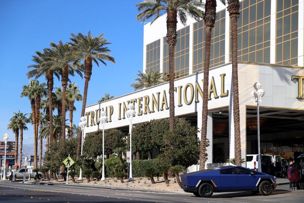 A Tesla Cybertruck pulls into Trump International Hotel in Las Vegas Thursday, Jan. 2, 2025, in Las Vegas. (AP Photo/Ian Maule)