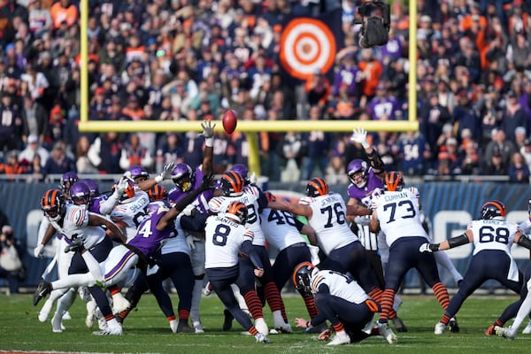 Chicago Bears place kicker Cairo Santos (8) makes a field goal during the first half of an NFL football game against the Minnesota Vikings, Sunday, Nov. 24, 2024, in Chicago. (AP Photo/Charles Rex Arbogast)