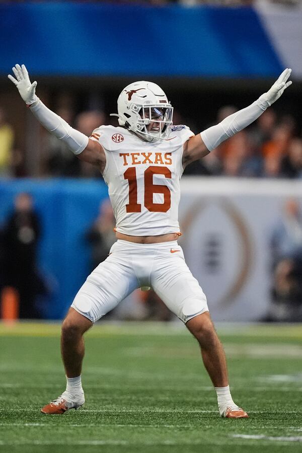 Texas defensive back Michael Taaffe (16) celebrates a play against Arizona State during the first half in the quarterfinals of a College Football Playoff, Wednesday, Jan. 1, 2025, in Atlanta. (AP Photo/Brynn Anderson)