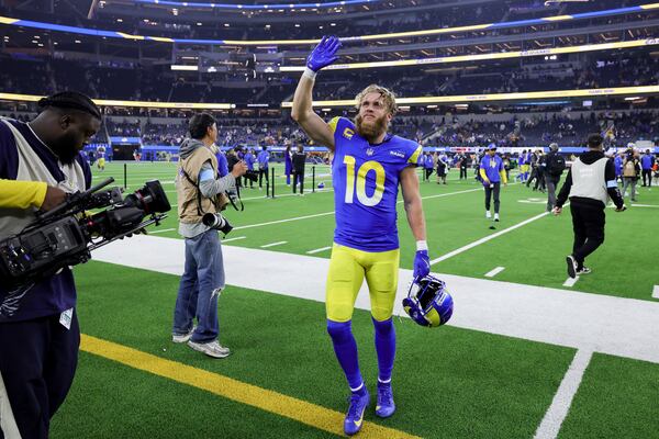 Los Angeles Rams wide receiver Cooper Kupp (10) waves as he leaves the field following a win over the Arizona Cardinals in an NFL football game Saturday, Dec. 28, 2024, in Inglewood, Calif. (AP Photo/Ryan Sun)