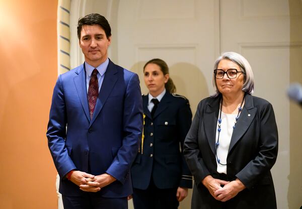 Canada's Prime Minister Justin Trudeau and Gov. Gen. Mary Simon look on at the start of a cabinet swearing in ceremony for Dominic LeBlanc, not shown, who will be sworn in as Finance Minister, at Rideau Hall in Ottawa, Ontario, Monday, Dec. 16, 2024. (Justin Tang/The Canadian Press via AP)