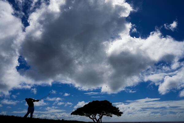 Hideki Matsuyama, of Japan, hits from the 17th tee during the final round of the Sony Open golf event, Sunday, Jan. 12, 2025, at Waialae Country Club in Honolulu. (AP Photo/Matt York)