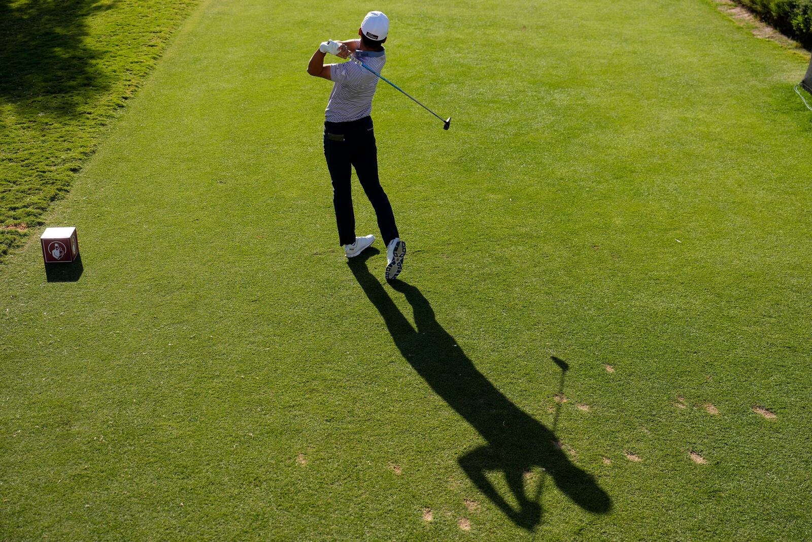 Michael Kim hits off the first tee during the first round of Shriners Children's Open golf tournament Thursday, Oct. 17, 2024, in Las Vegas. (AP Photo/John Locher)