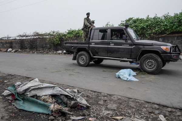 Members of M23 rebel patrol on the street of Goma, Congo Thursday, Jan. 30, 2025. (AP Photo/Brian Inganga)