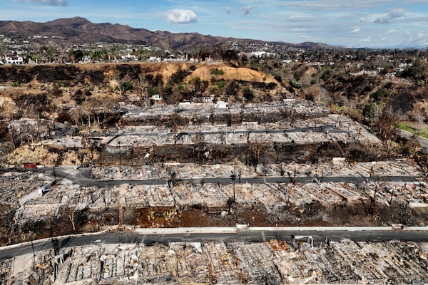 An aerial view shows the devastation left by the Palisades Fire in the Pacific Palisades section of Los Angeles, Monday, Jan. 27, 2025. (AP Photo/Jae C. Hong)