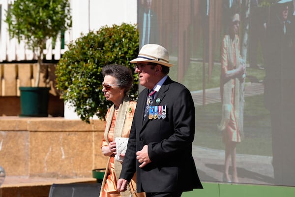 Britain's Princess Anne, the President of the Commonwealth War Graves Commission, left, attends the opening of a memorial dedicated to more than 1,700 Black South African servicemen who died in non-combatant roles in World War I and have no known grave, in Cape Town, South Africa, Wednesday, Jan. 22, 2025. (AP Photo/Nardus Engelbrecht)