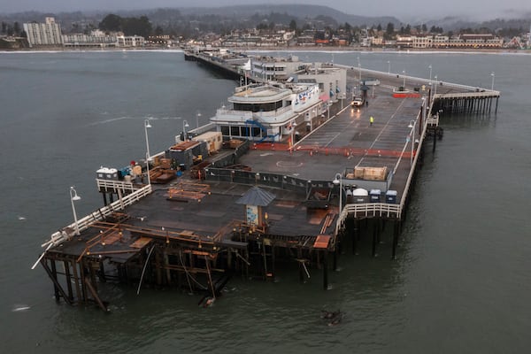 Damage to the Santa Cruz Wharf is seen in Santa Cruz, Calif., Tuesday, Dec. 24, 2024. (AP Photo/Nic Coury)