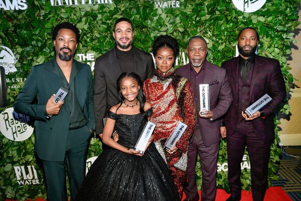 Actors Corey Hawkins, from left, Ray Fisher, Skylar Aleece Smith, Danielle Deadwyler, Michael Potts, and John David Washington pose with their ensemble tribute awards for "The Piano Lesson" during The Gothams Film Awards at Cipriani Wall Street on Monday, Dec. 2, 2024, in New York. (Photo by Evan Agostini/Invision/AP)