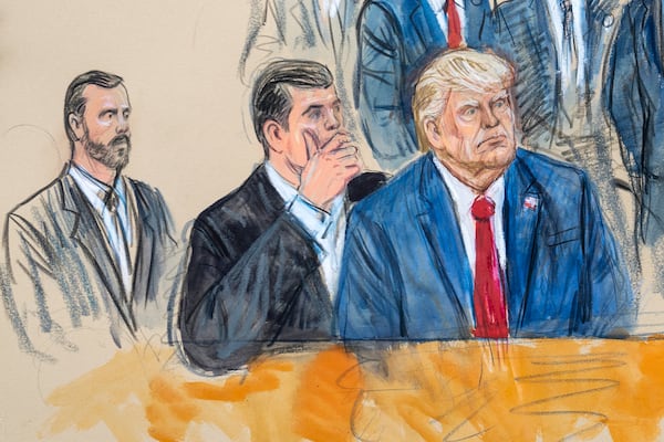 FILE - This artist sketch depicts former President Donald Trump, right, conferring with defense lawyer Todd Blanche, center, during his appearance at the Federal Courthouse in Washington, Thursday, Aug. 3, 2023. Special Prosecutor Jack Smith sits at left. (Dana Verkouteren via AP, File)