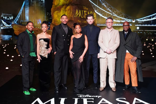 From left to right Kelvin Harrison Jr., Tiffany Boone, Aaron Pierre, Anika Noni Rose, Billy Eichner, Seth Rogan and Barry Jenkins attend a photo call for Mufasa: The Lion King at Potters Field, in London, Wednesday, Dec. 11, 2024. (Ian West/PA via AP)