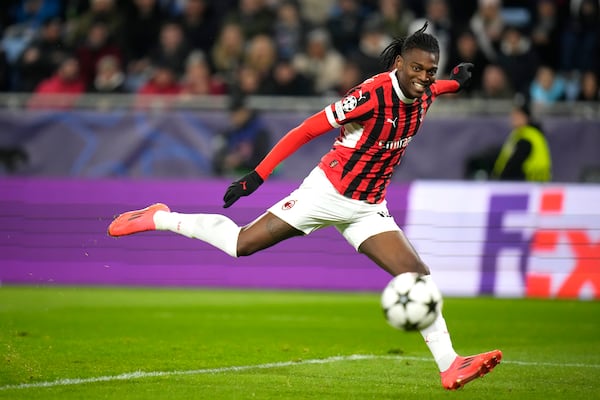 AC Milan's Rafael Leao scores the second goal against Slovan Bratislava during the Champions League opening phase soccer match between Slovan Bratislava and AC Milan in Bratislava, Slovakia, on Tuesday, Nov. 26, 2024. (AP Photo/Petr David Josek)