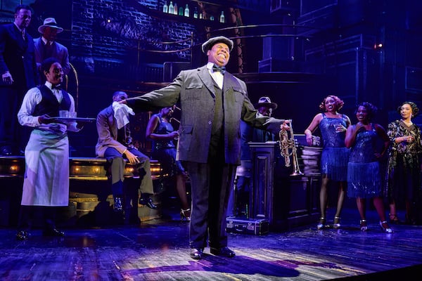 James Monroe Iglehart portrays Louis Armstrong during a performance in "A Wonderful World: The Louis Armstrong Musical" in New York. (Jeremy Daniel via AP)