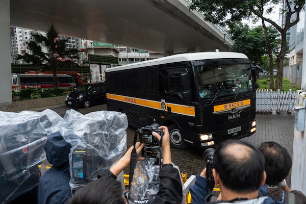 A Correctional Services Department vehicle arrives at the West Kowloon Magistrates' Courts in Hong Kong Tuesday, Nov. 19, 2024, ahead of the sentencing in national security case. (AP Photo/Chan Long Hei)