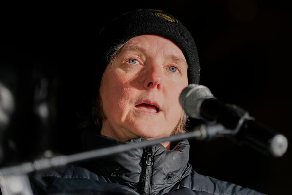 Madison Mayor Satya Rhodes-Conway speaks during a candlelight vigil Tuesday, Dec. 17, 2024, outside the Wisconsin Capitol in Madison, Wis., following a shooting at the Abundant Life Christian School on Monday, Dec. 16. (AP Photo/Morry Gash)