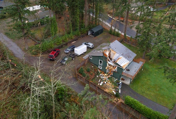 The roof of a house remains damaged on Sunday, Nov. 24, 2024, in Sammamish, Wash., after last week's "bomb cyclone" wreaked havoc throughout Western Washington. (Nick Wagner/The Seattle Times via AP)