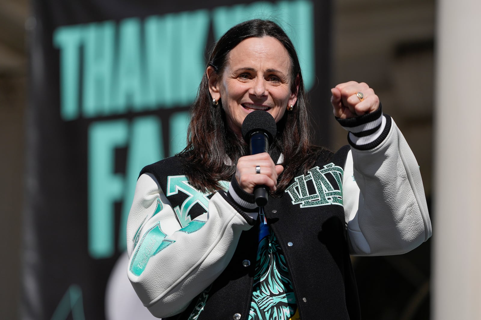 New York Liberty head coach Sandy Brondello speaks during a ceremony after a parade in honor of the Liberty's WNBA basketball championship at City Hall in New York, Thursday, Oct. 24, 2024. (AP Photo/Seth Wenig)