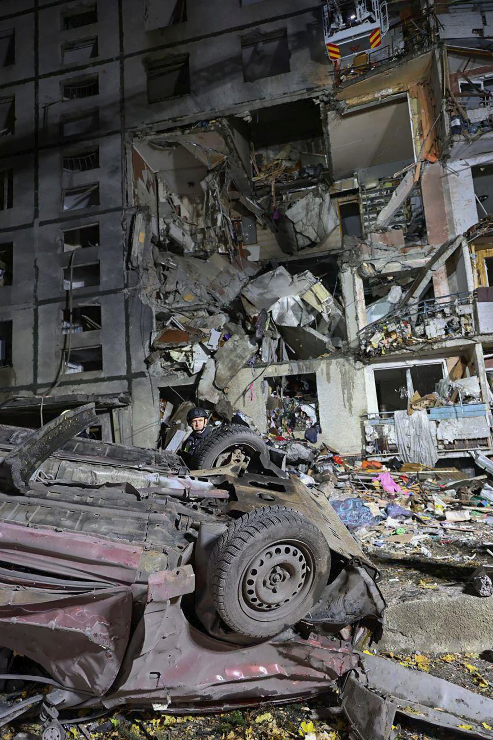 In this photo provided by Kharkiv City Administration a multi-storey apartment building is seen damaged by Russian attack in Kharkiv, Ukraine, late Wednesday, Oct. 30, 2024. (Kharkiv City Administration via AP)