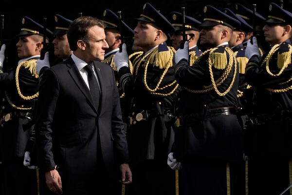 French President Emmanuel Macron reviews the honor guard upon his arrival for his meeting with Lebanese President Joseph Aoun at the presidential palace in Baabda, in east of Beirut, Lebanon, Friday, Jan. 17, 2025. (AP Photo/Bilal Hussein)