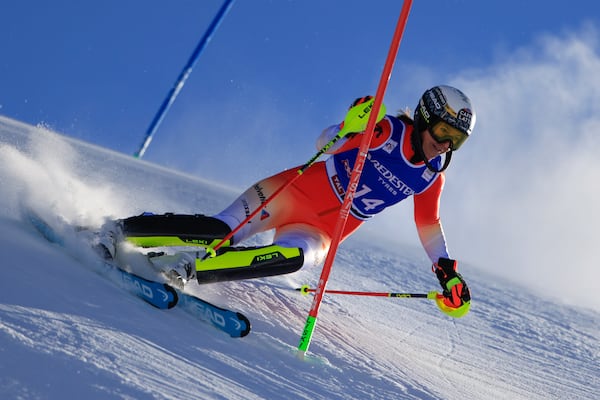 Switzerland's Wendy Holdener speeds down the course during an alpine ski, women's World Cup slalom, in Gurgl, Austria, Saturday, Nov. 23, 2024. (AP Photo/Giovanni Maria Pizzato)