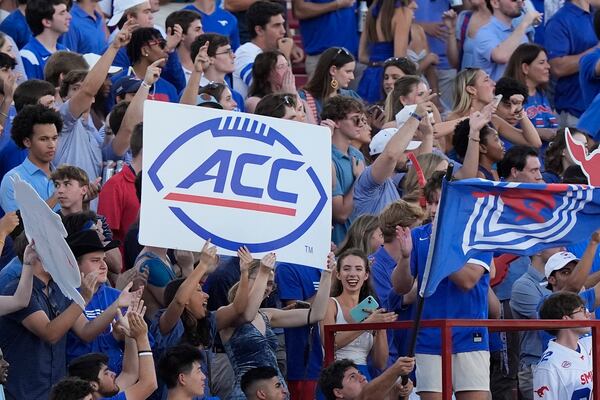 FILE - Fans in the SMU student section hold up a sign during the first half of an NCAA college football game against Florida State, Saturday, Sept. 28, 2024, in Dallas. (AP Photo/LM Otero, File)