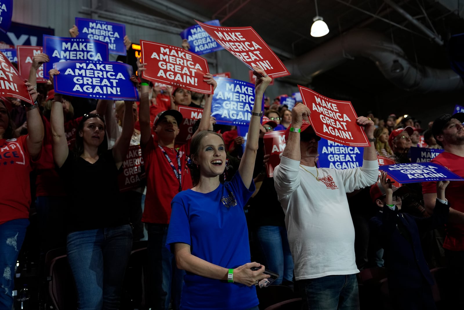 Supporters cheer Republican presidential nominee former President Donald Trump at a campaign rally at Rocky Mount Event Center, Wednesday, Oct. 30, 2024, in Rocky Mount, N.C. (AP Photo/Julia Demaree Nikhinson)