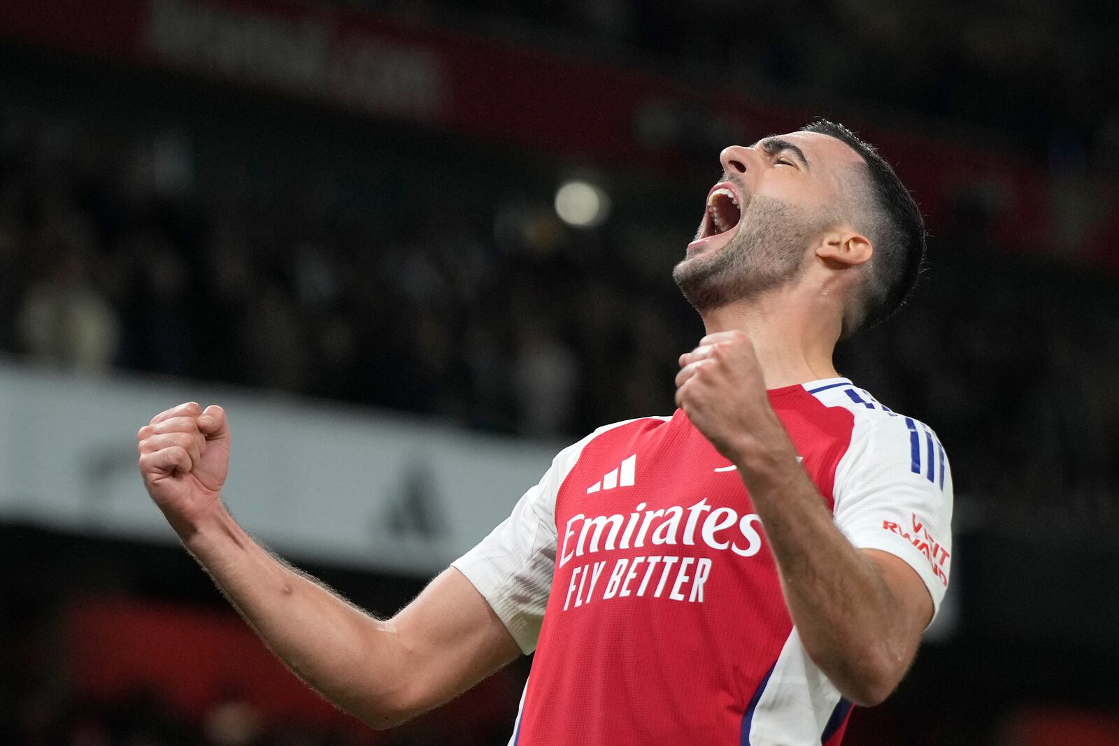 Arsenal's Mikel Merino celebrates after scoring his side's second goal during the English Premier League soccer match between Arsenal and Liverpool, at Emirates Stadium in London, England, Sunday, Oct. 27, 2024. (AP Photo/Alastair Grant)