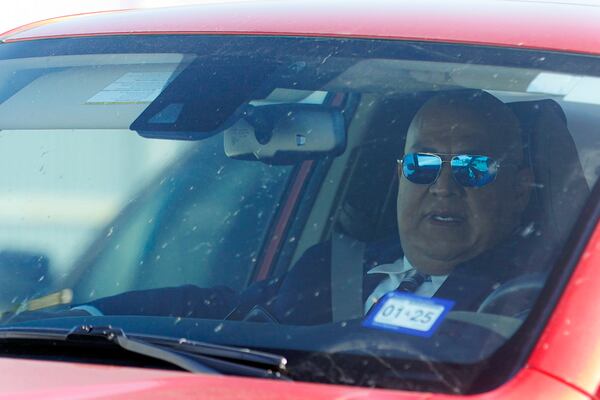 Former Uvalde school district police chief Pete Arredondo is driven away from the Uvalde County Justice Center, Thursday morning, Dec. 19, 2024, in Uvalde, Texas. (Sam Owens/The San Antonio Express-News via AP)