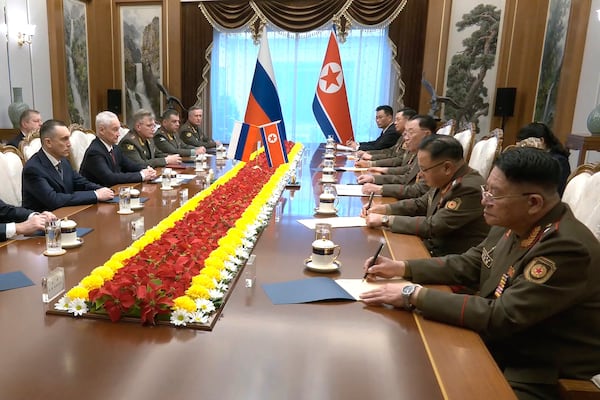 In this photo taken from a video released by Russian Defense Ministry press service, Russian Defense Minister Andrei Belousov, second left, speaks with North Korean Defense Minister No Kwang Chol, third right, during their meeting in Pyongyang, North Korea Friday, Nov. 29, 2024. (Russian Defense Ministry Press Service via AP)