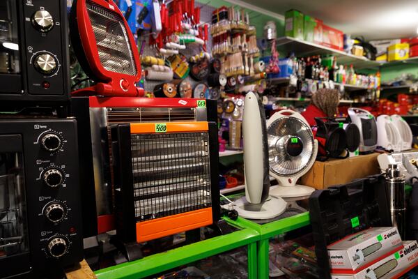 Electrical heaters on display in a village shop in Copanca, Moldova, Wednesday, Jan. 8, 2025. (AP Photo)