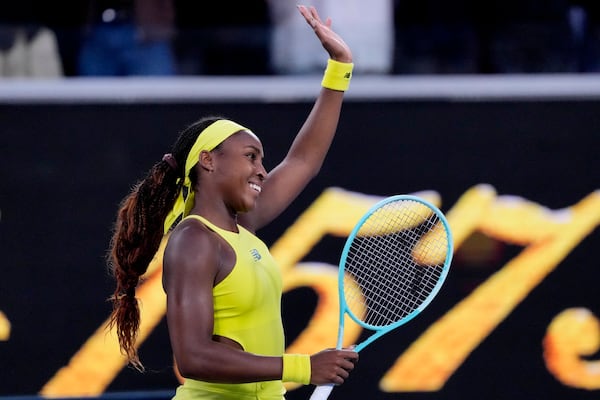 Coco Gauff of the U.S. waves after defeating Leylah Fernandez of Canada in their third round match at the Australian Open tennis championship in Melbourne, Australia, Friday, Jan. 17, 2025. (AP Photo/Vincent Thian)