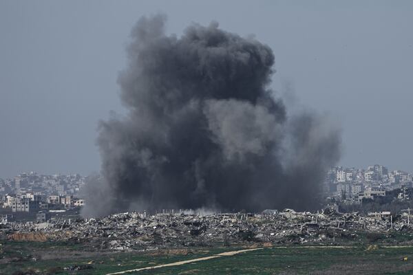 Smoke rises following an Israeli bombardment in the Gaza Strip, as seen from southern Israel on Sunday, Jan. 19, 2025. (AP Photo/Tsafrir Abayov)